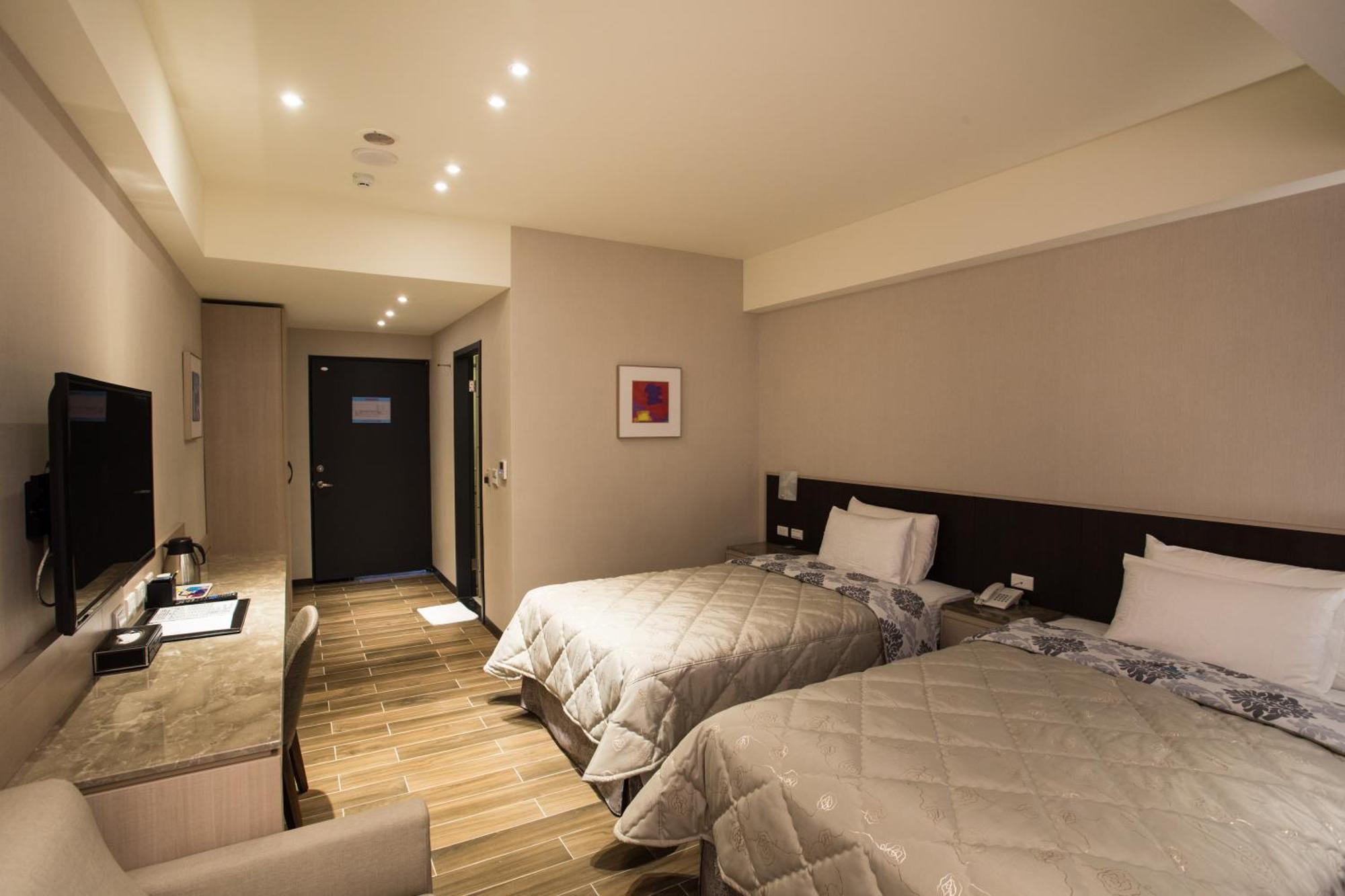 VeryGood Business Hotel Huatan Zimmer foto