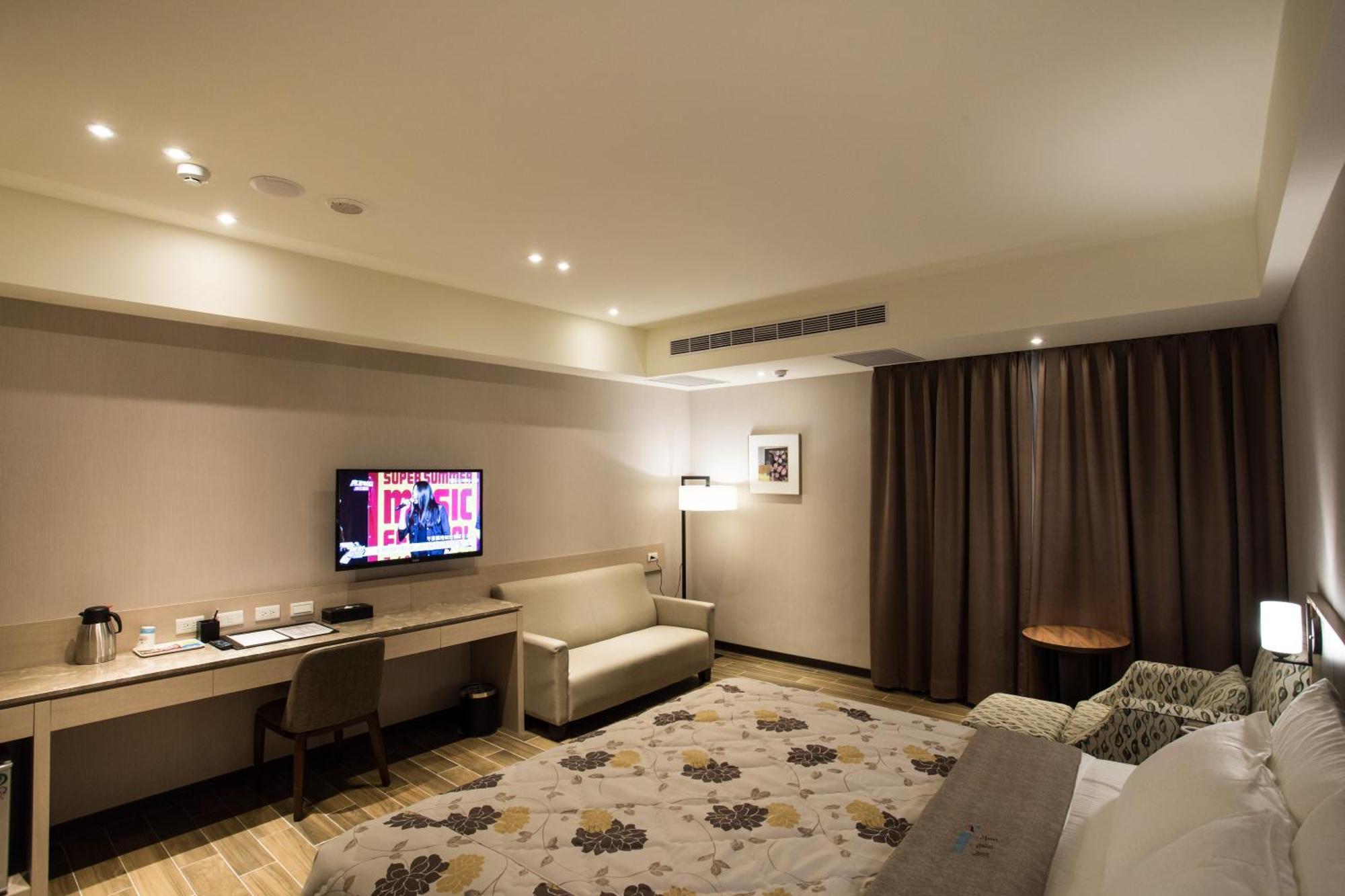 VeryGood Business Hotel Huatan Zimmer foto