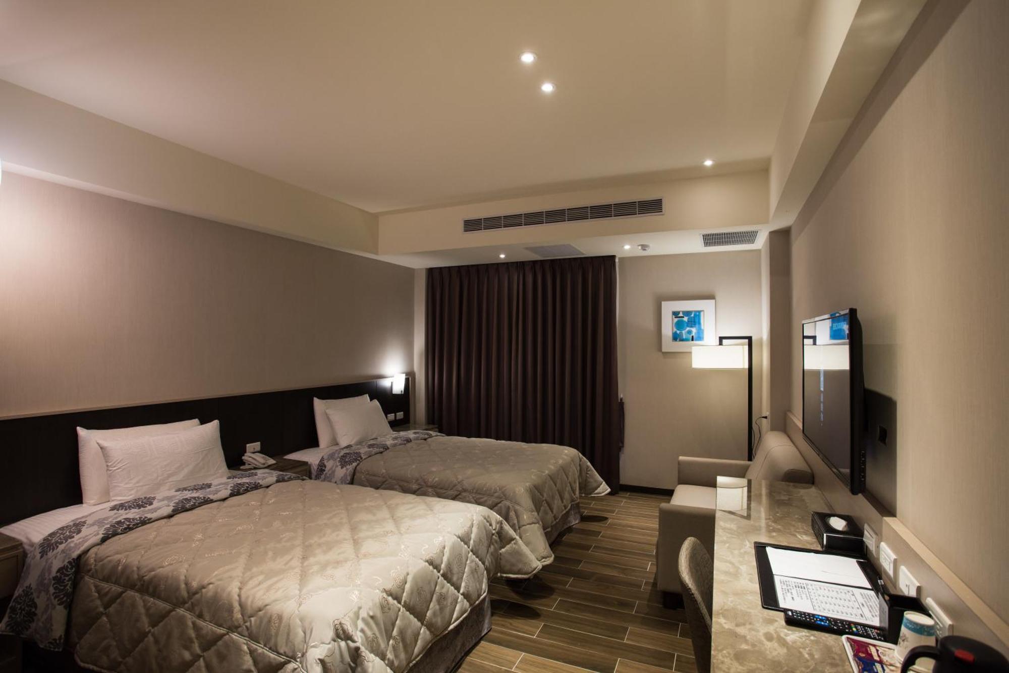 VeryGood Business Hotel Huatan Zimmer foto