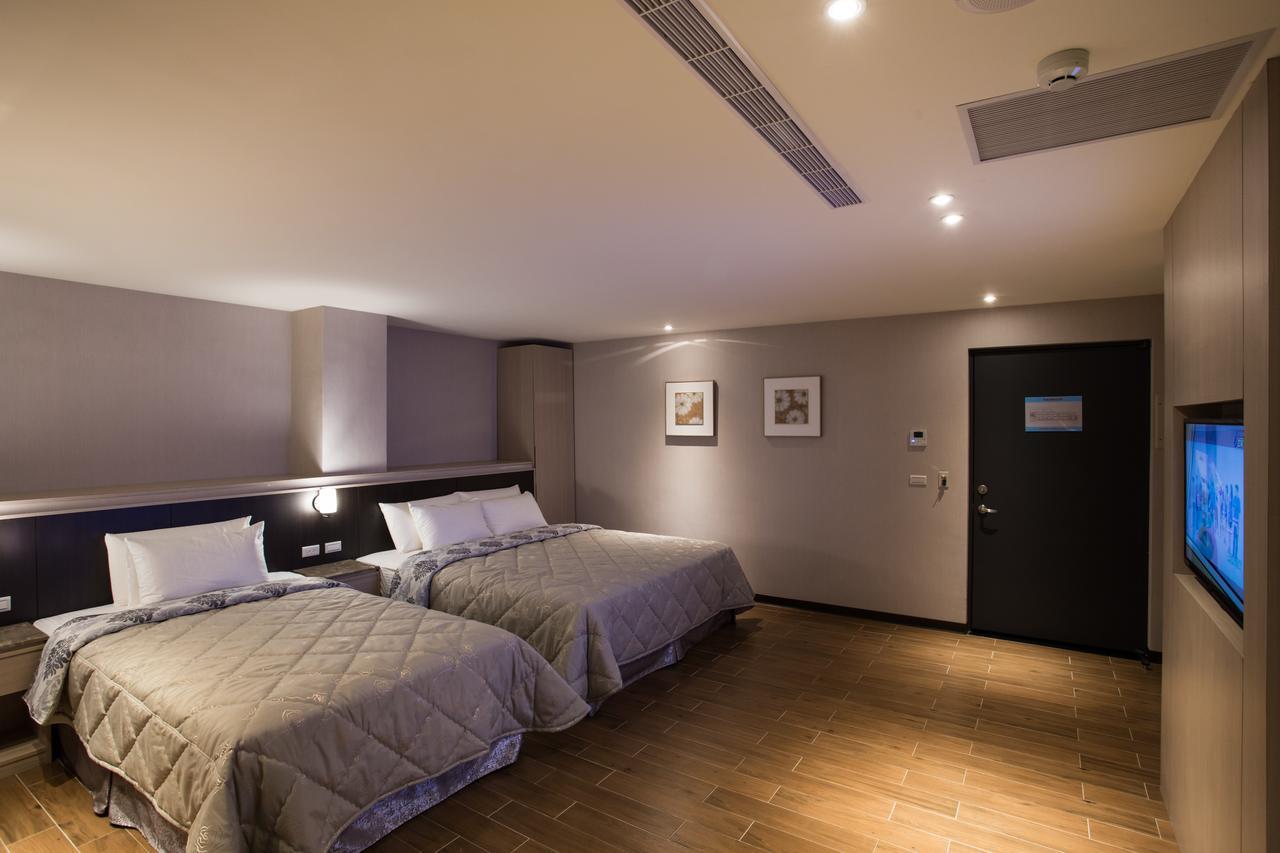 VeryGood Business Hotel Huatan Zimmer foto